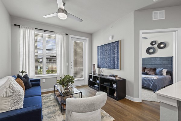 living room at Peak at 1385 Apartments