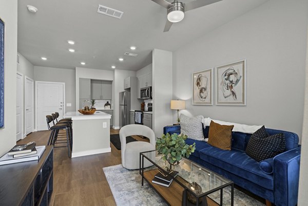 living room at Peak at 1385 Apartments
