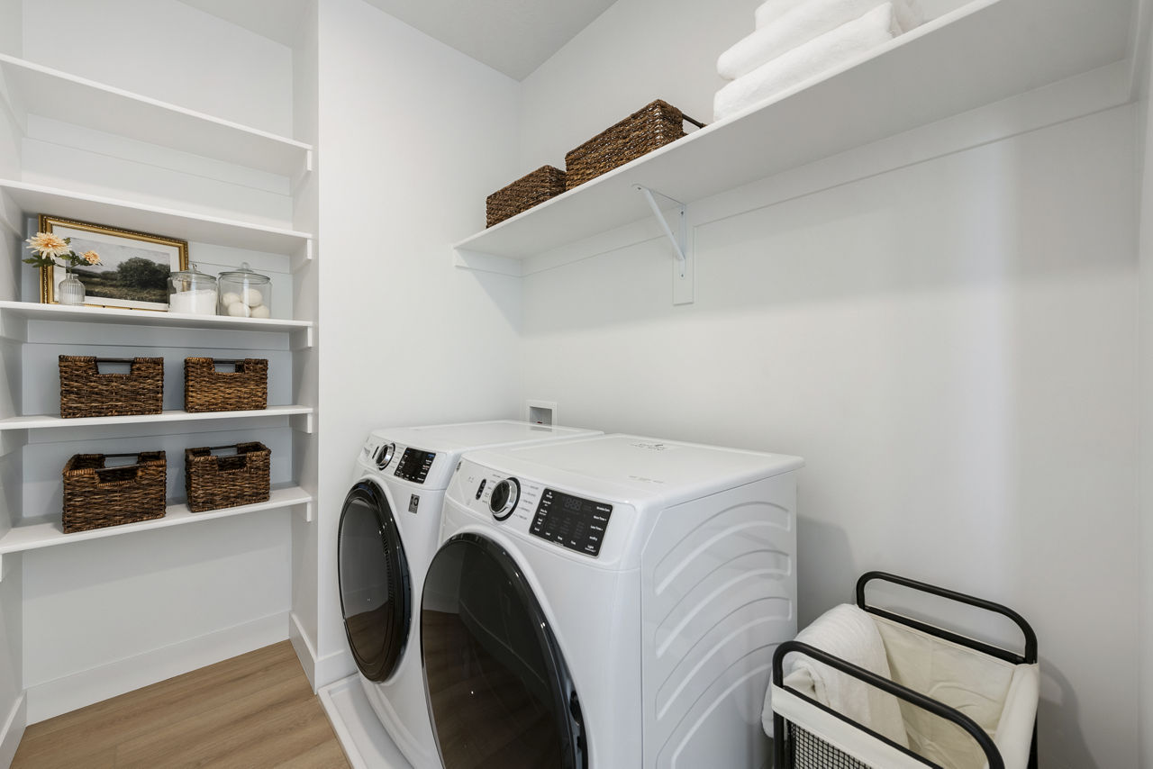 Laundry room at Viviano At Saratoga Springs
