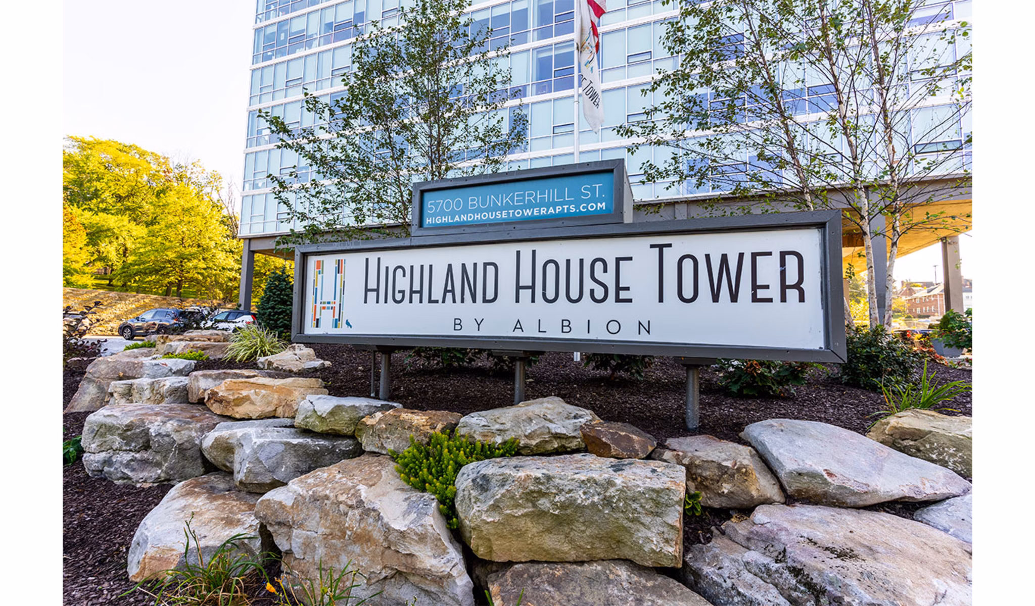 signage at Highland House Tower Apartments