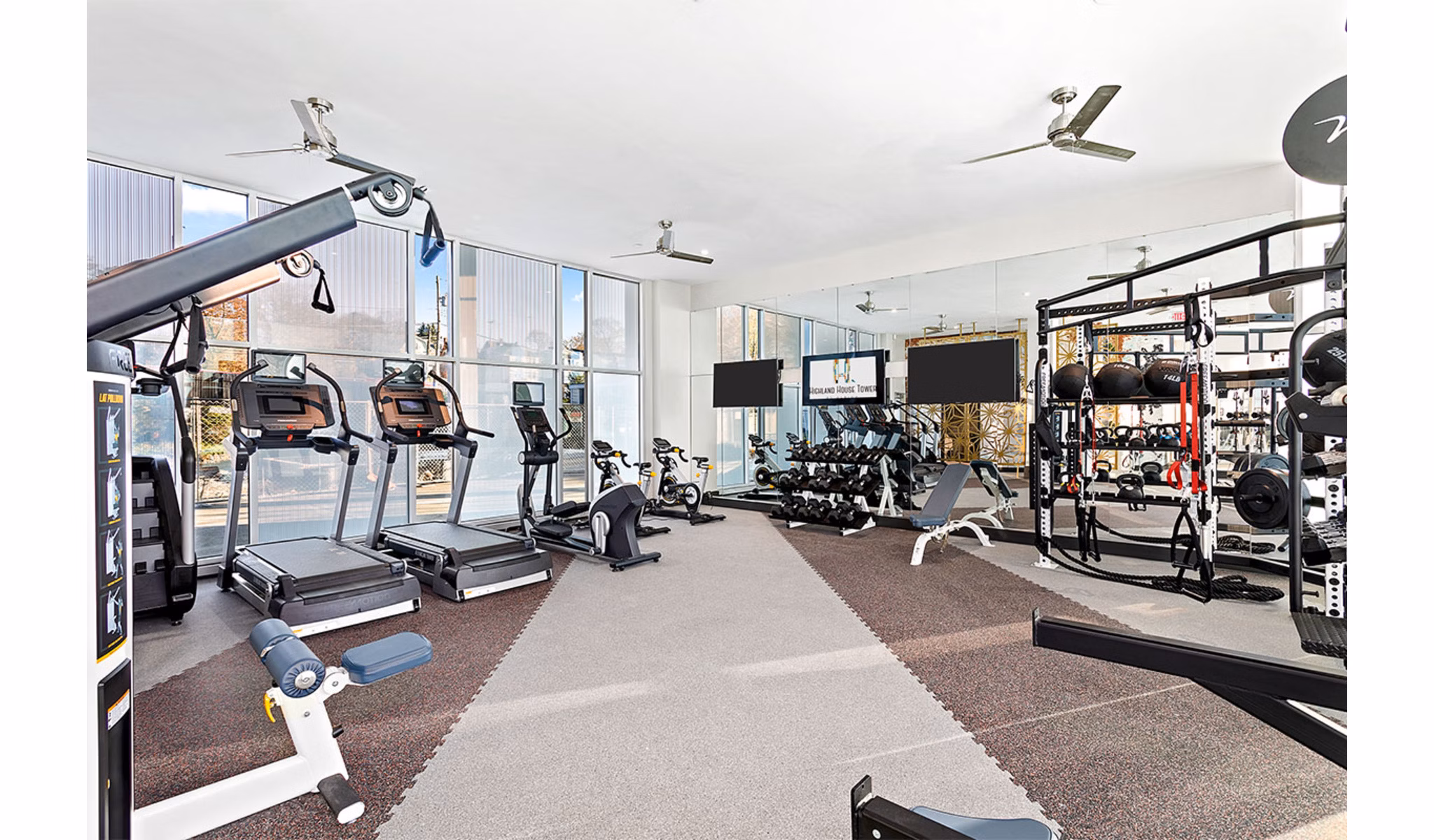 fitness center at Highland House Tower Apartments