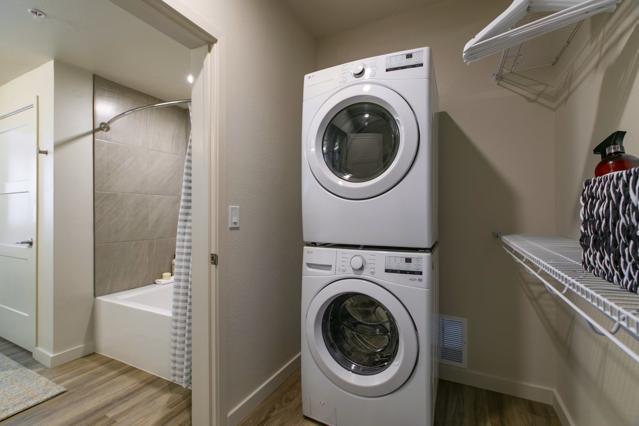 laundry room at The Senary by Allaso Apartments