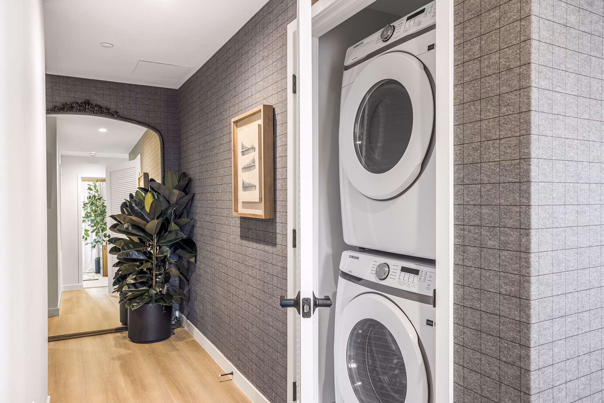 Laundry Room at Alexan Camellia Apartments
