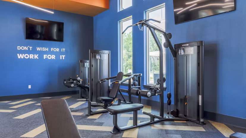 fitness center at The Waters at Settlers Trace Apartments