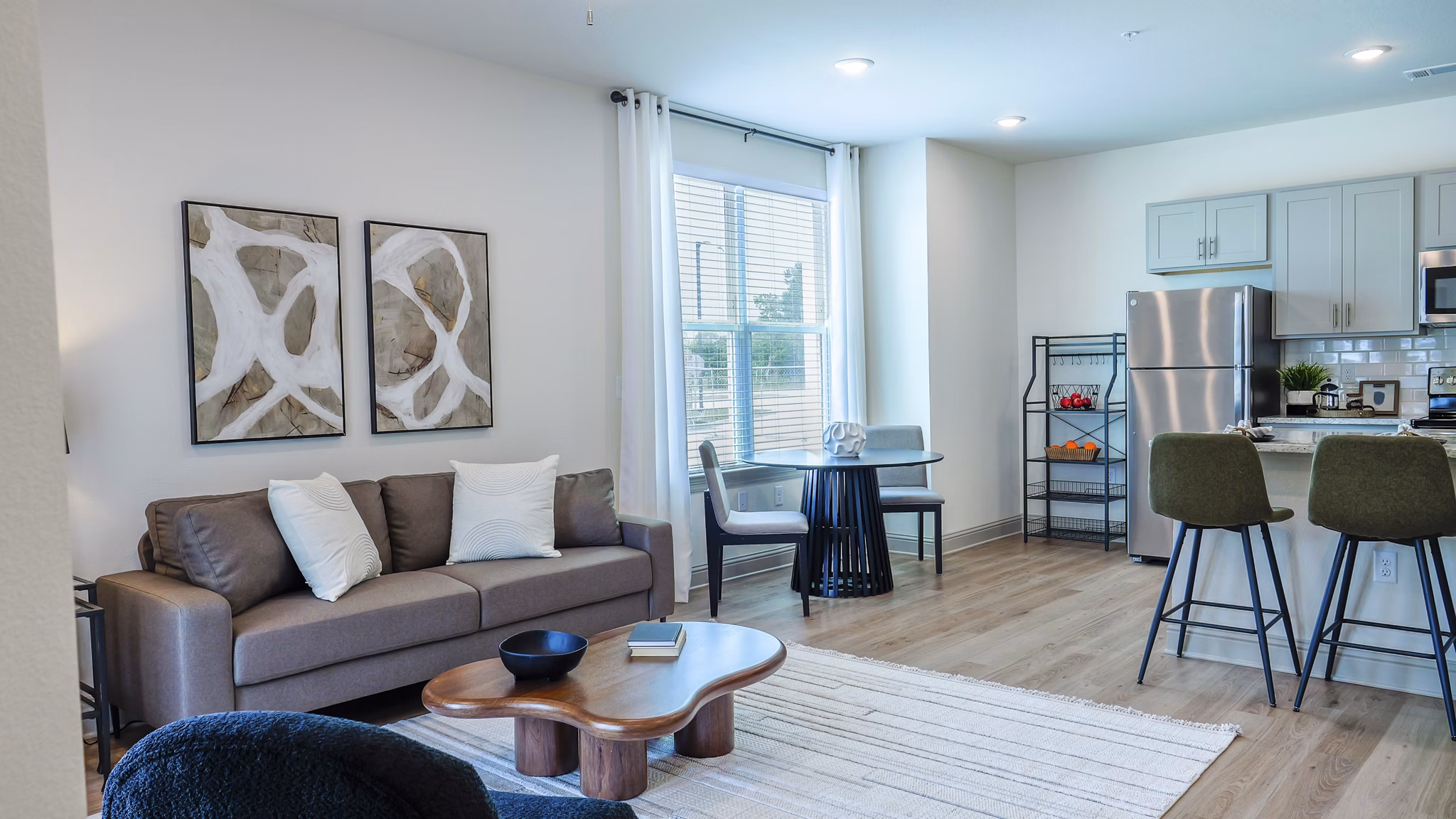 living room at The Waters at West Village Apartments 
