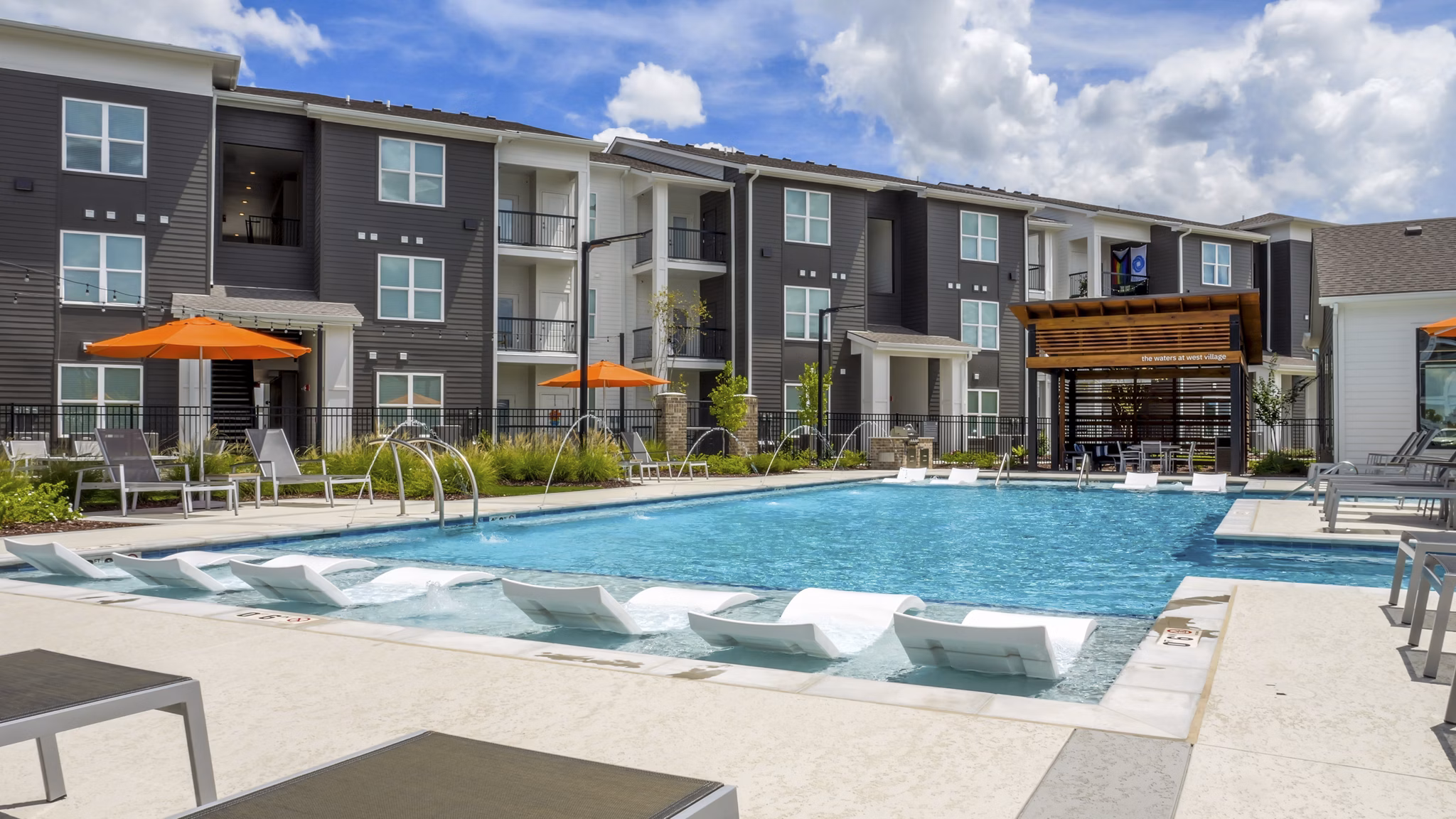 pool at The Waters at West Village Apartments 