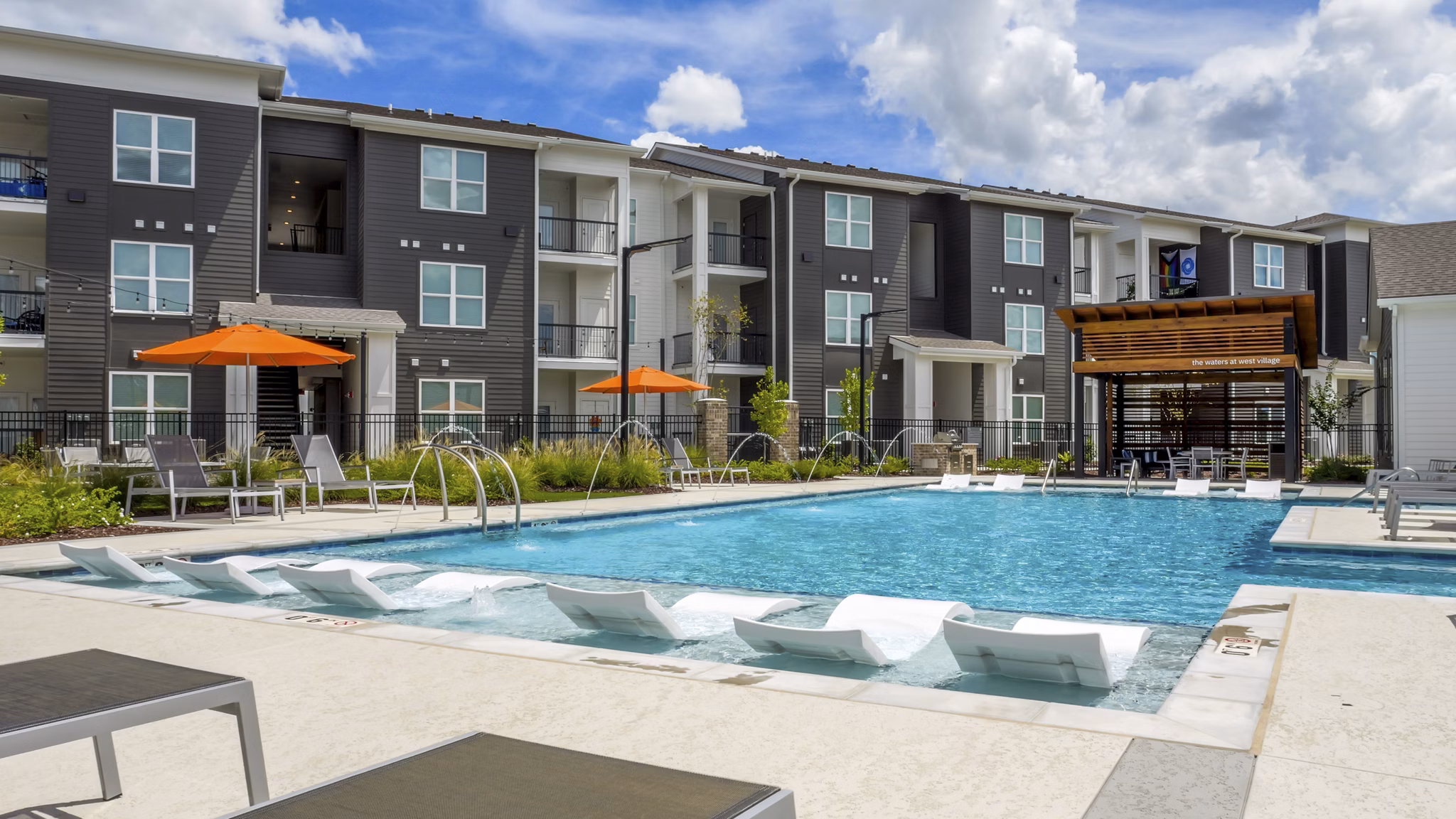 pool at The Waters at West Village Apartments 