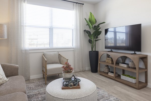 living room at Prose Riviana Apartments