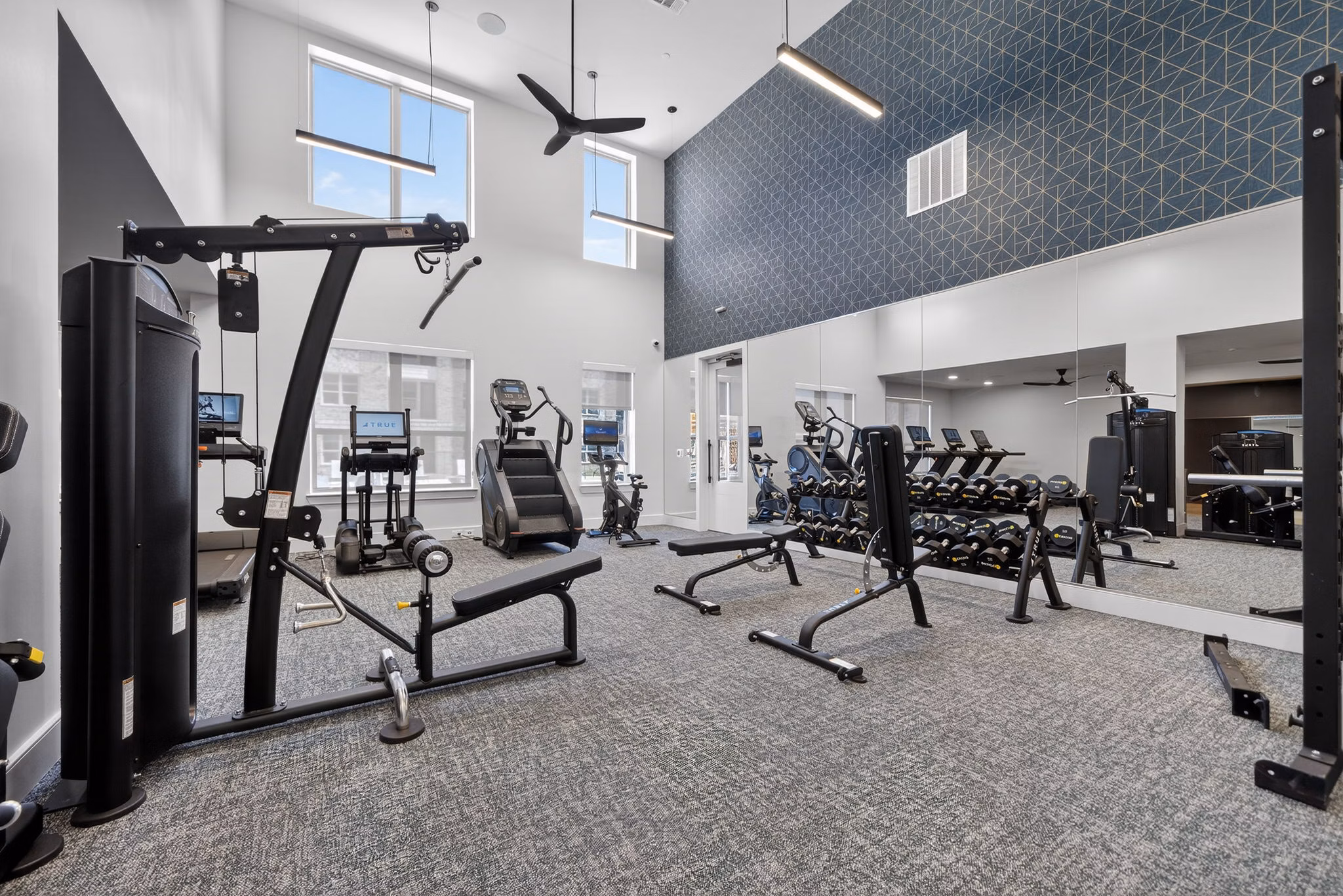 fitness center at Marlowe Corinth Groves Apartments