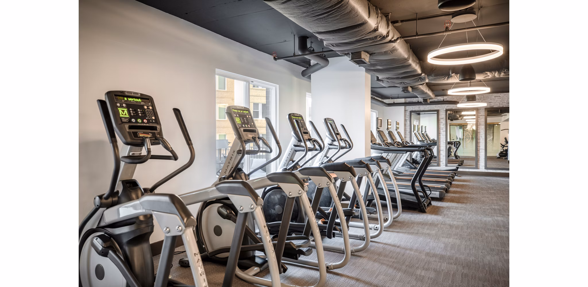 fitness center at Array at West Alex Apartments