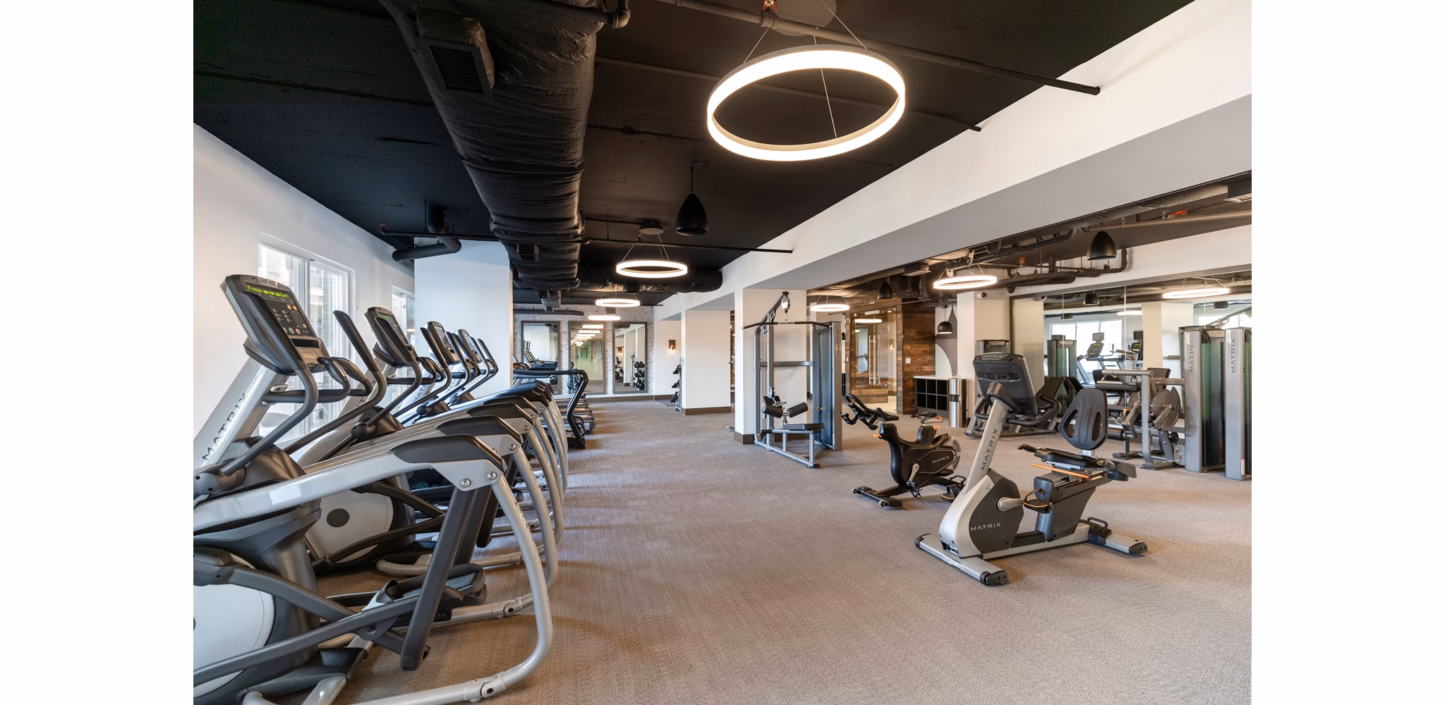 fitness center at Array at West Alex Apartments