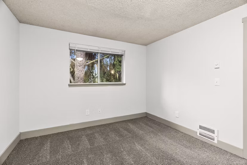 bedroom at Lodge at Madrona Apartments