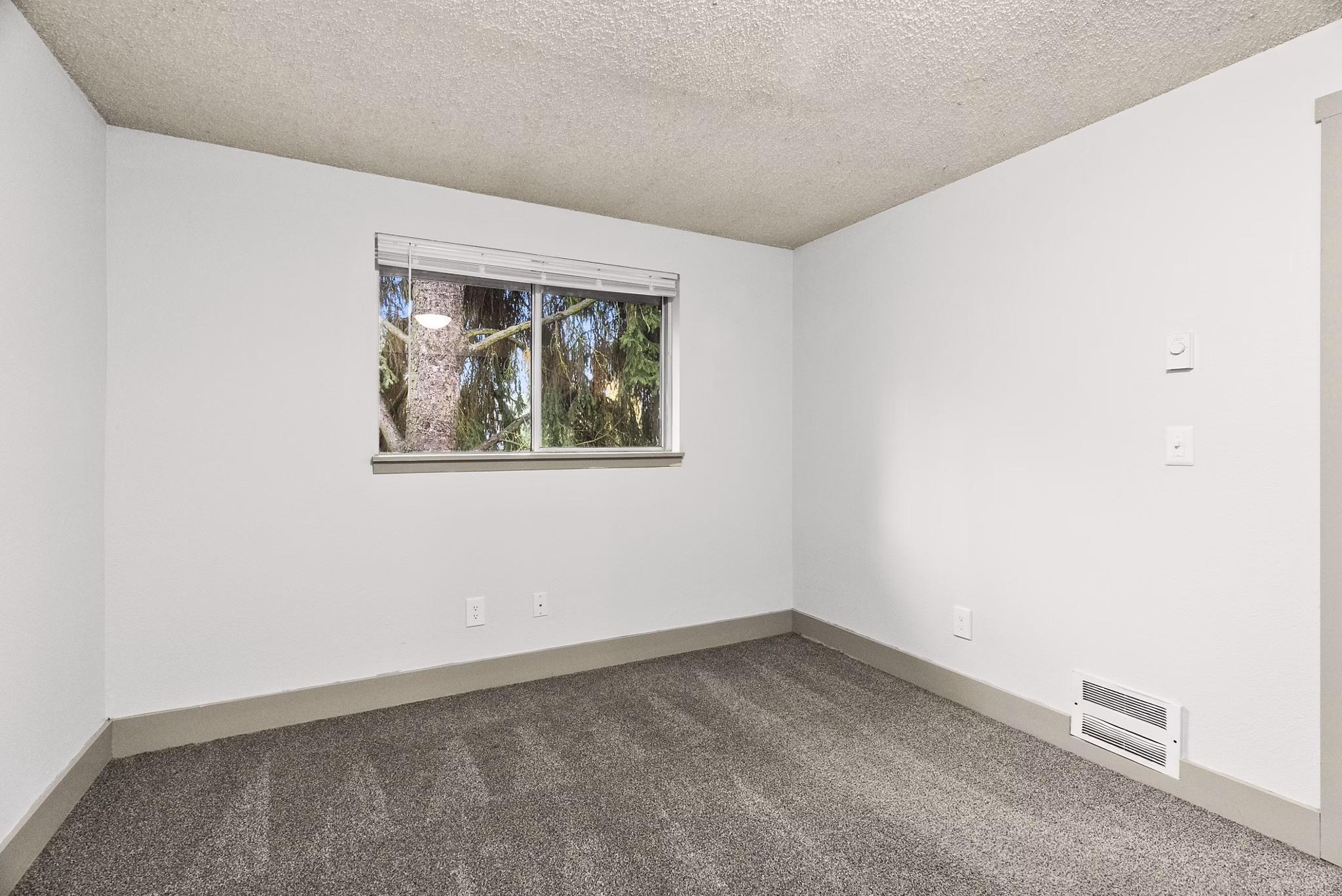 bedroom at Lodge at Madrona Apartments