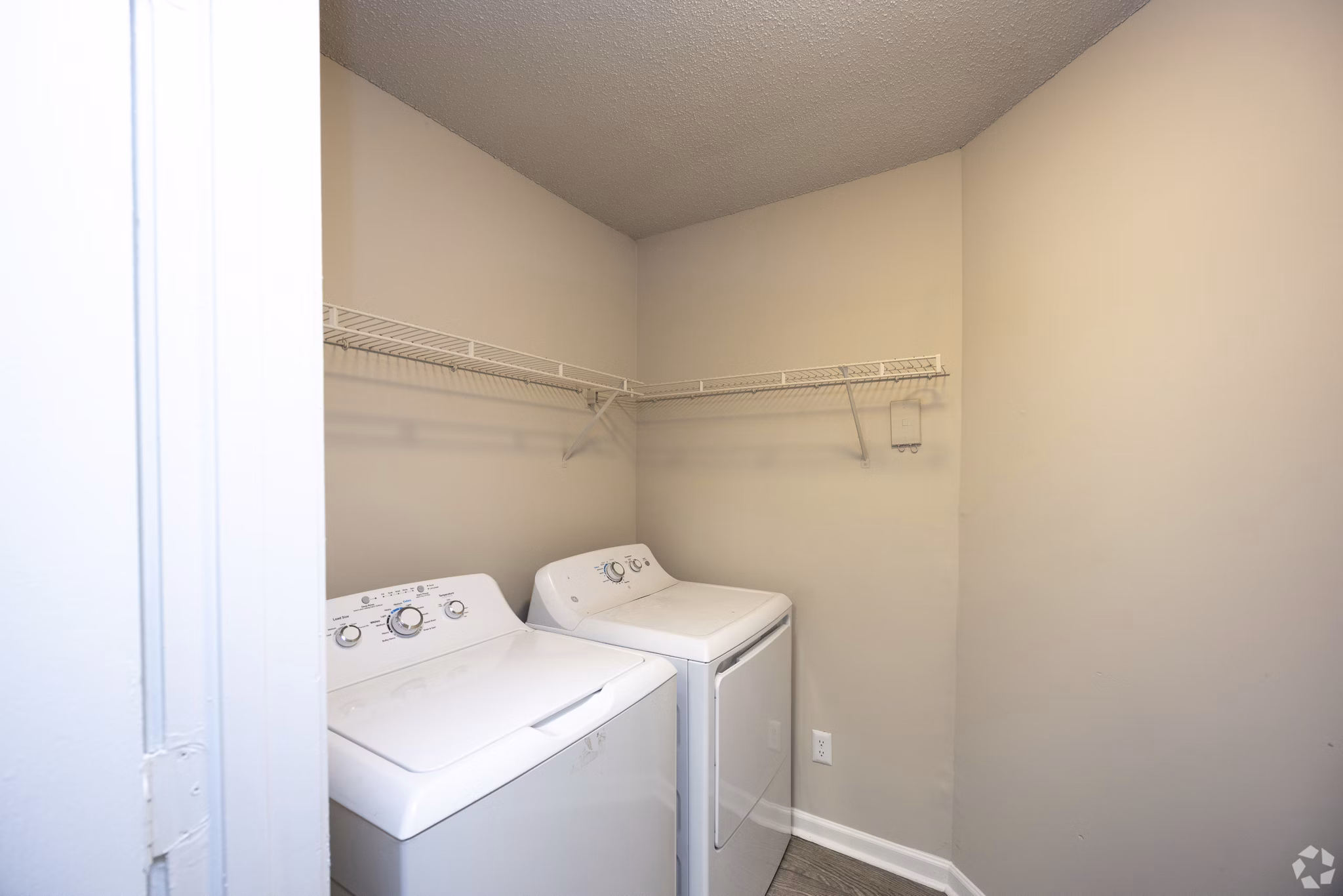 laundry room at Aqua at Sandy Springs Apartments