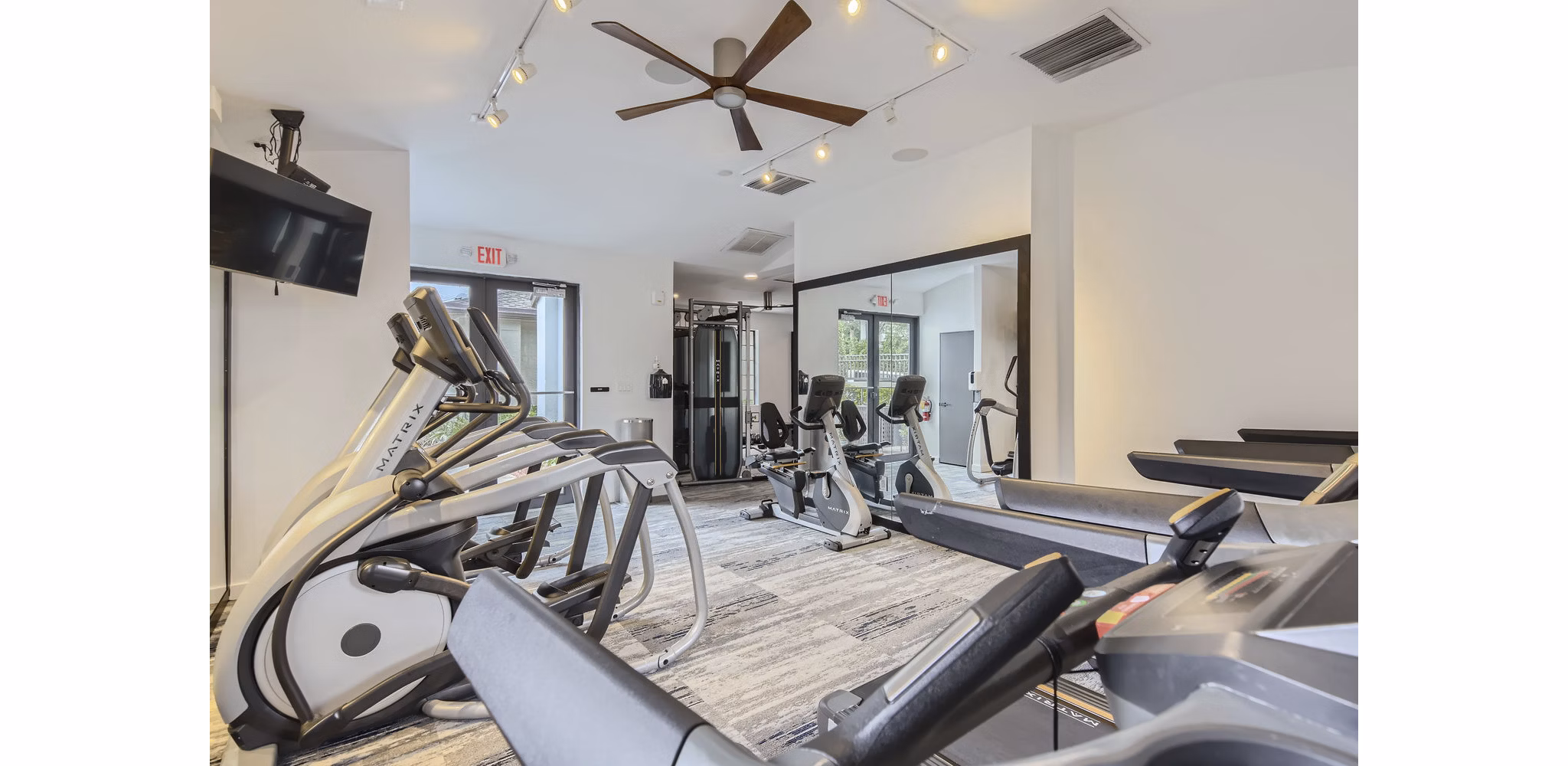 fitness center at Cascades at the Hammocks Apartments