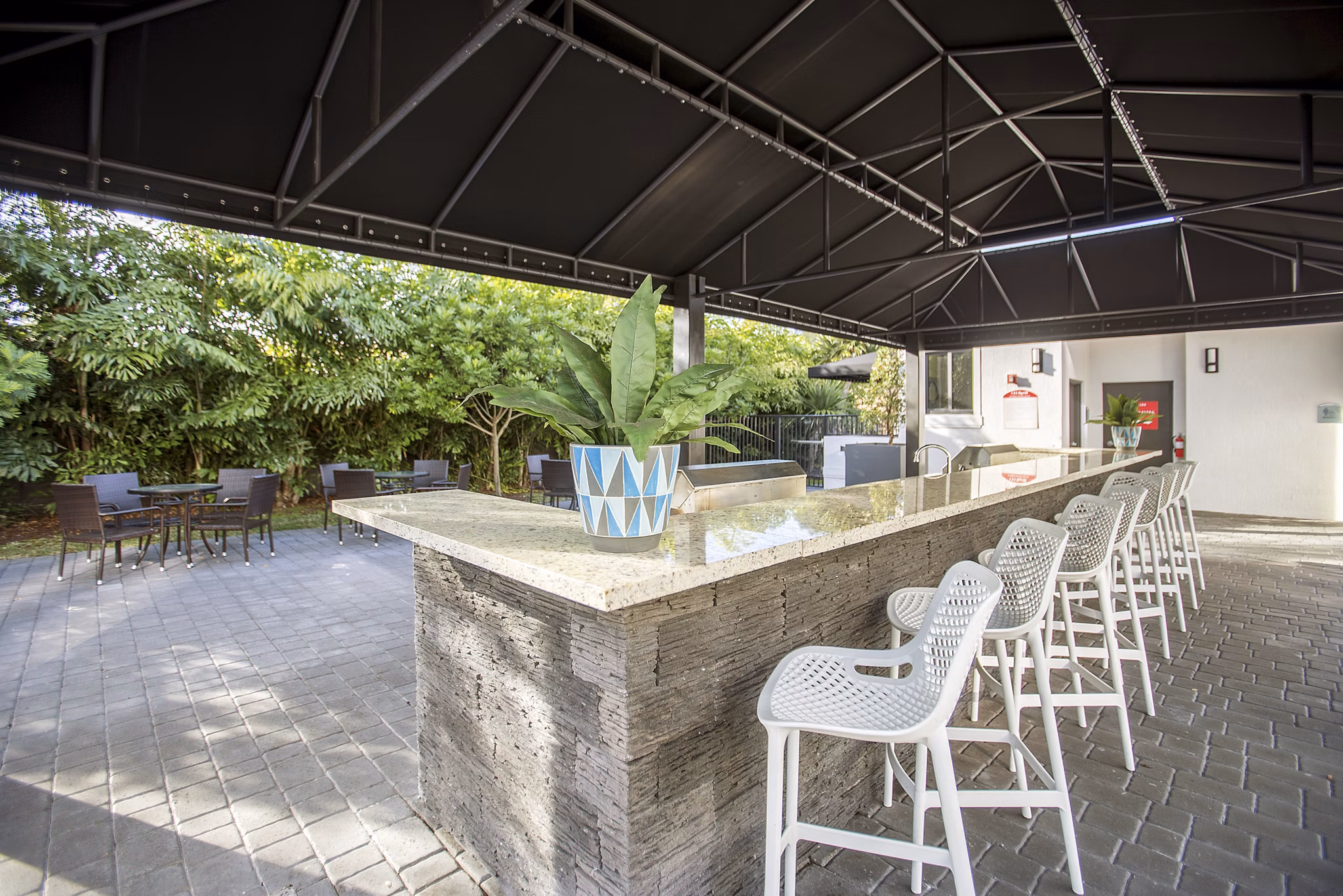 grill area/patio at Club Prado Apartments