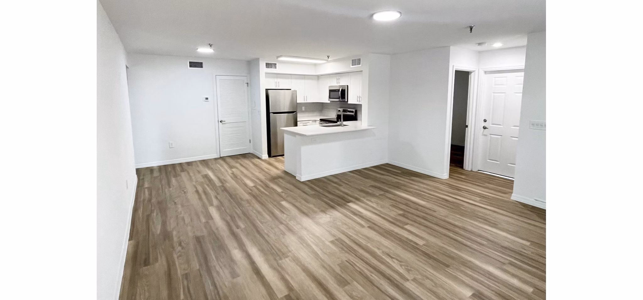 living room at Emerald Grove Apartments