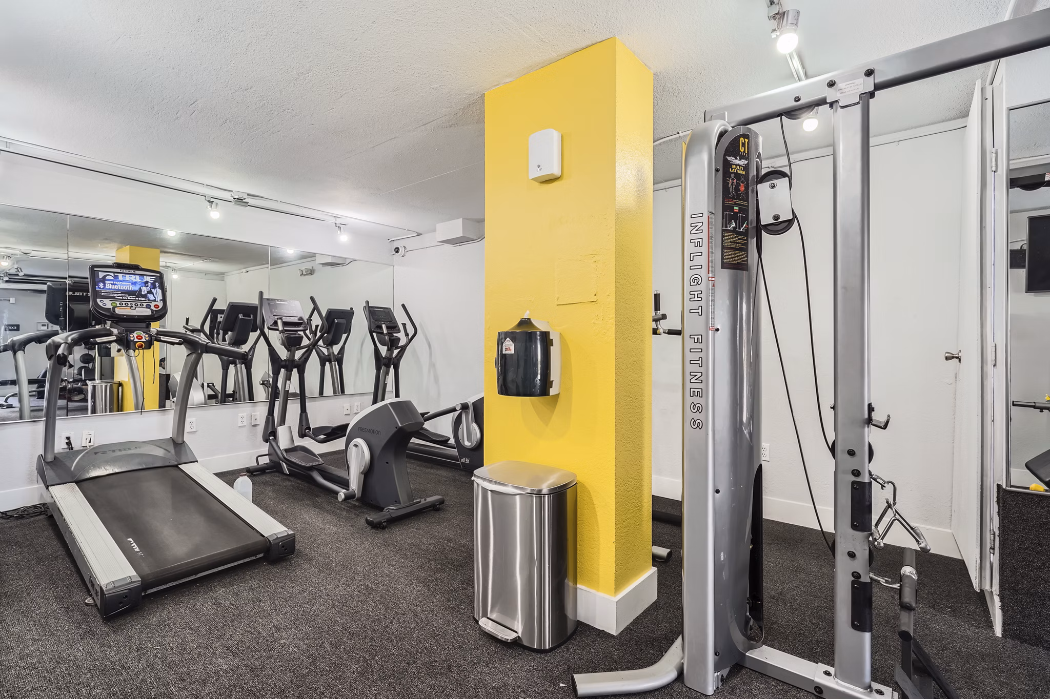 fitness center at Ludlam Point Apartments