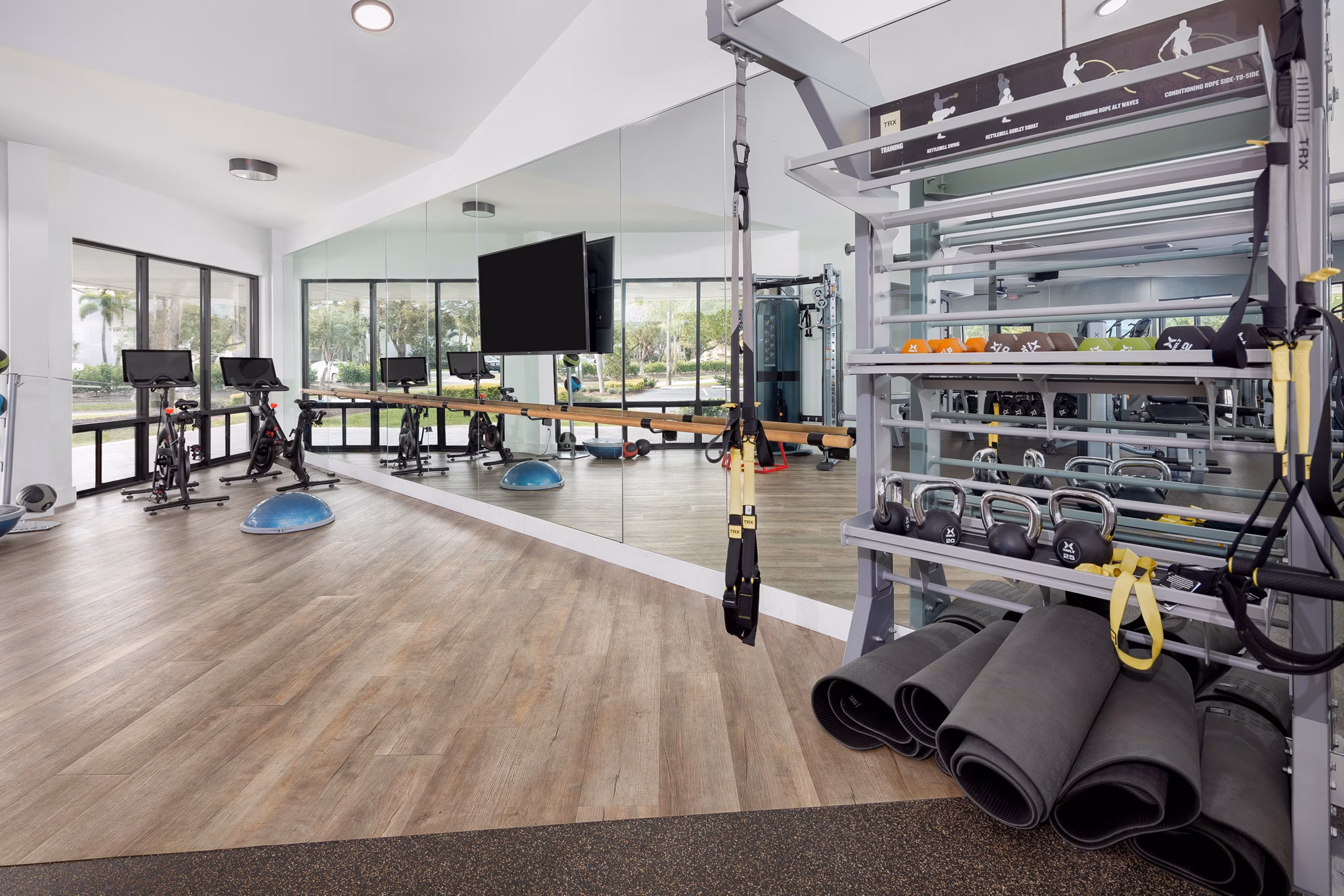 fitness center at The Seven at West Boca Apartments