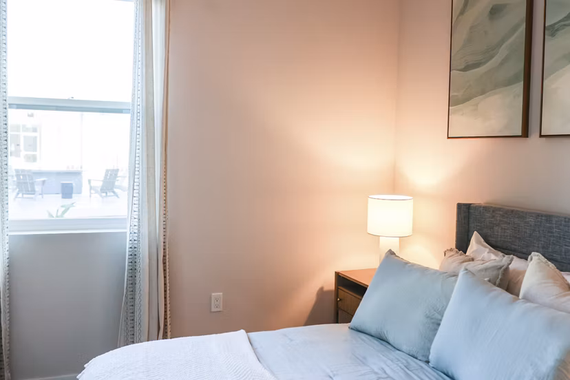 bedroom at The Grove at Woodlake Apartments