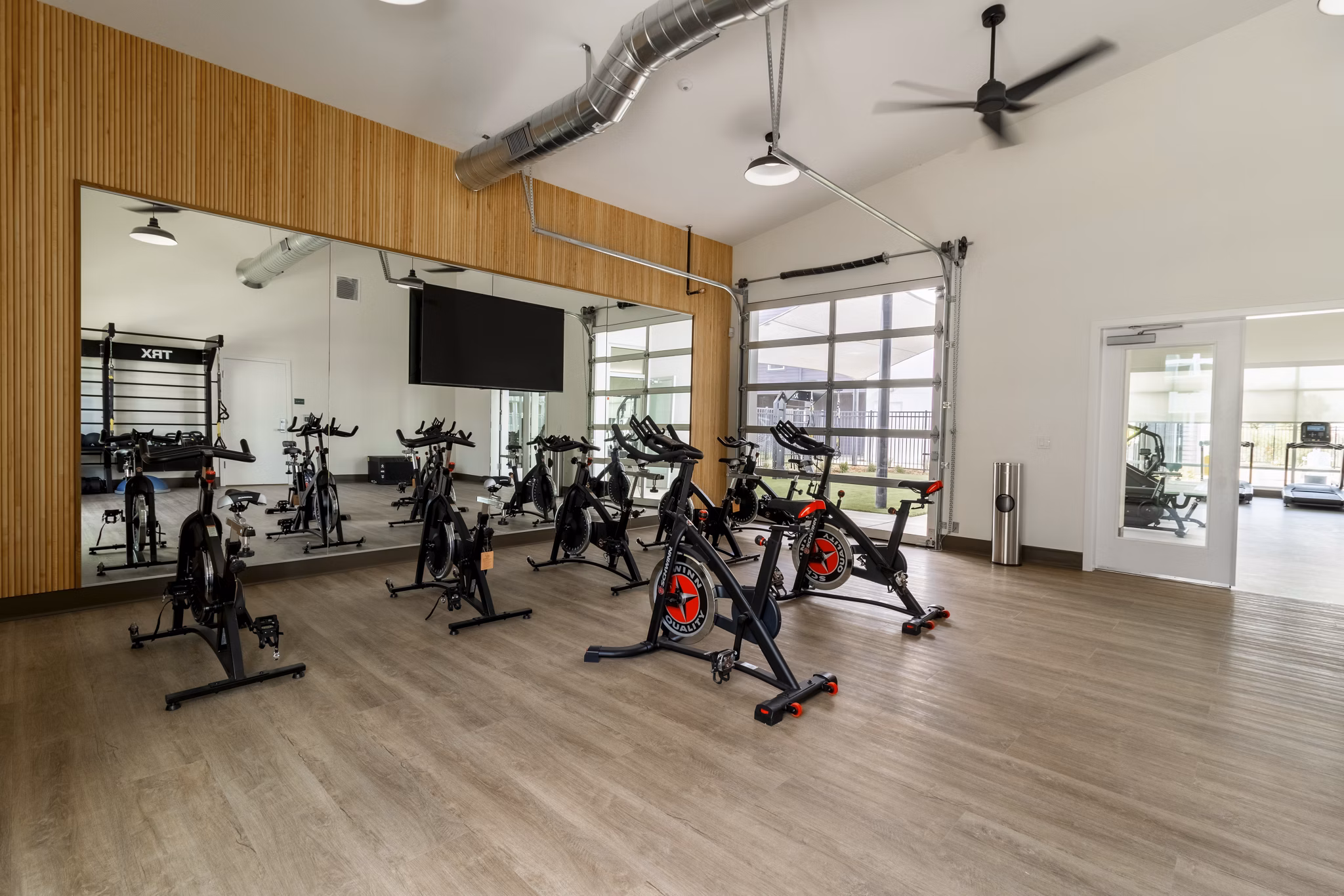 fitness center at The Grove at Woodlake Apartments