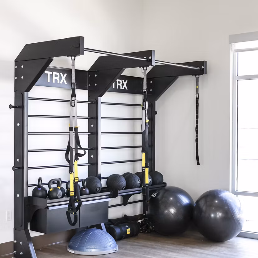 fitness center at The Grove at Woodlake Apartments