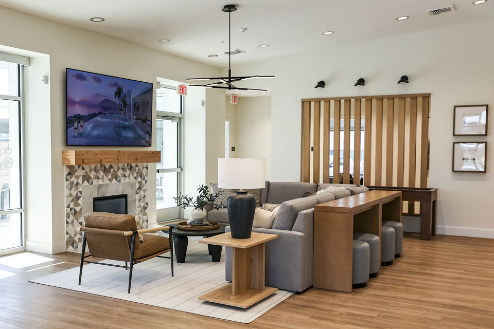living room at The Grove at Woodlake Apartments
