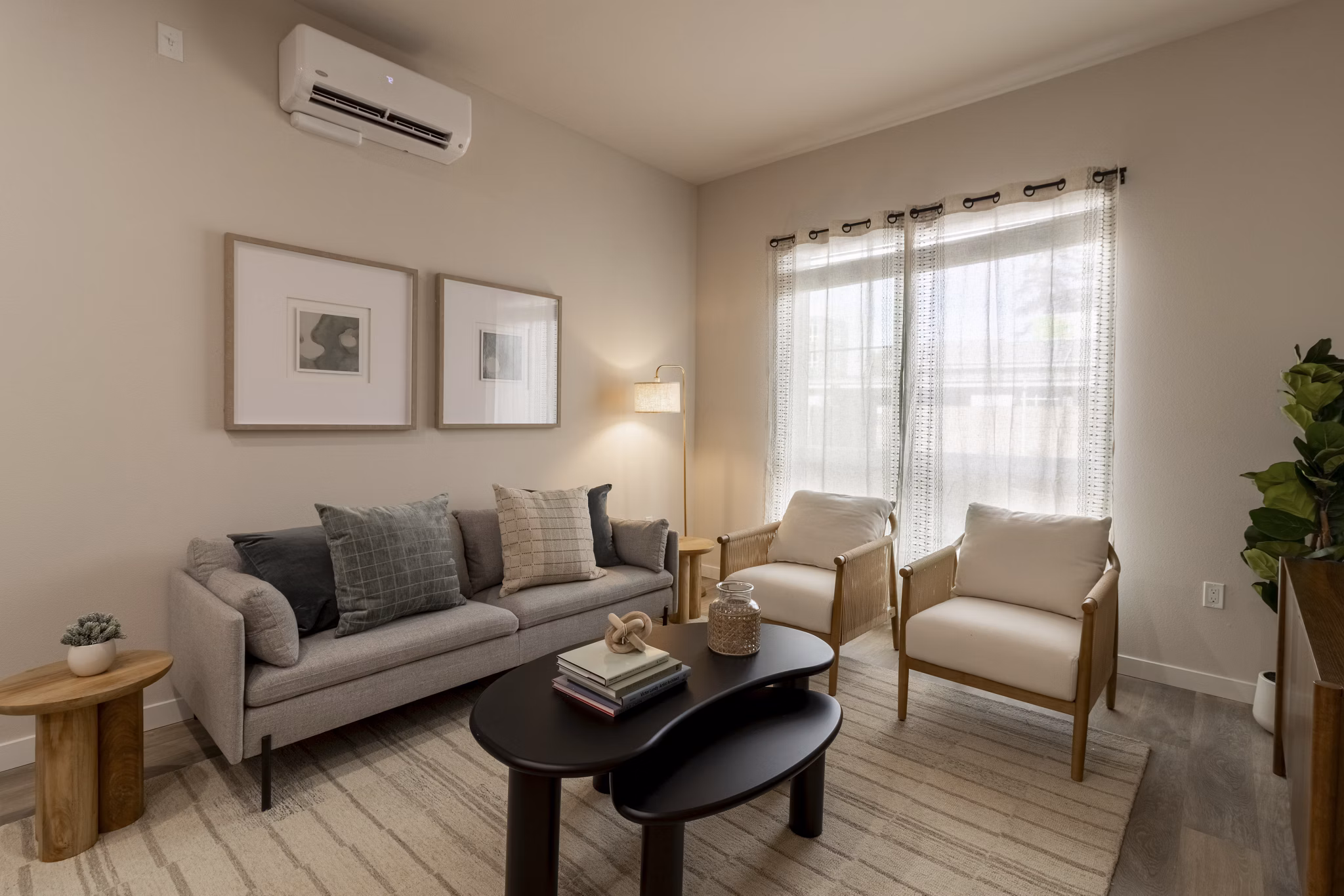 living room at The Grove at Woodlake Apartments