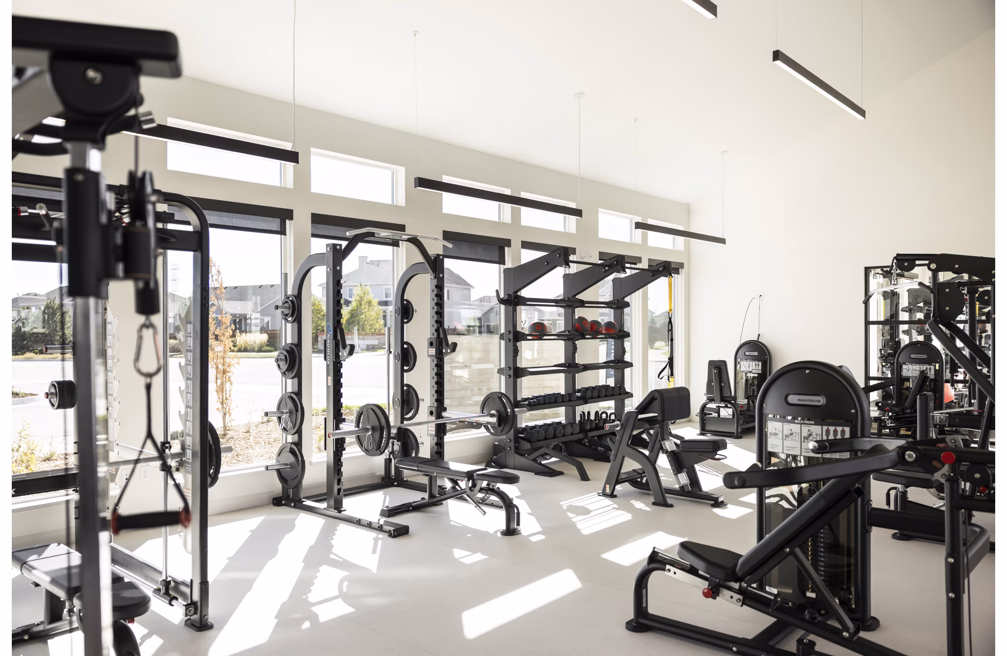fitness center at The Madison Apartments at Copperleaf Apartments