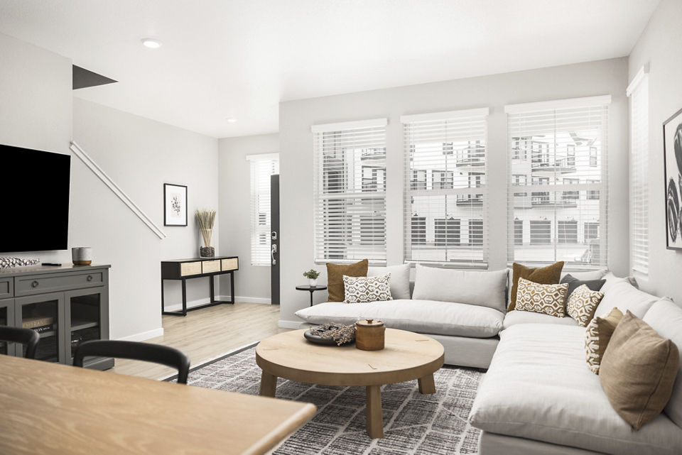 living room at The Madison Apartments at Copperleaf Apartments