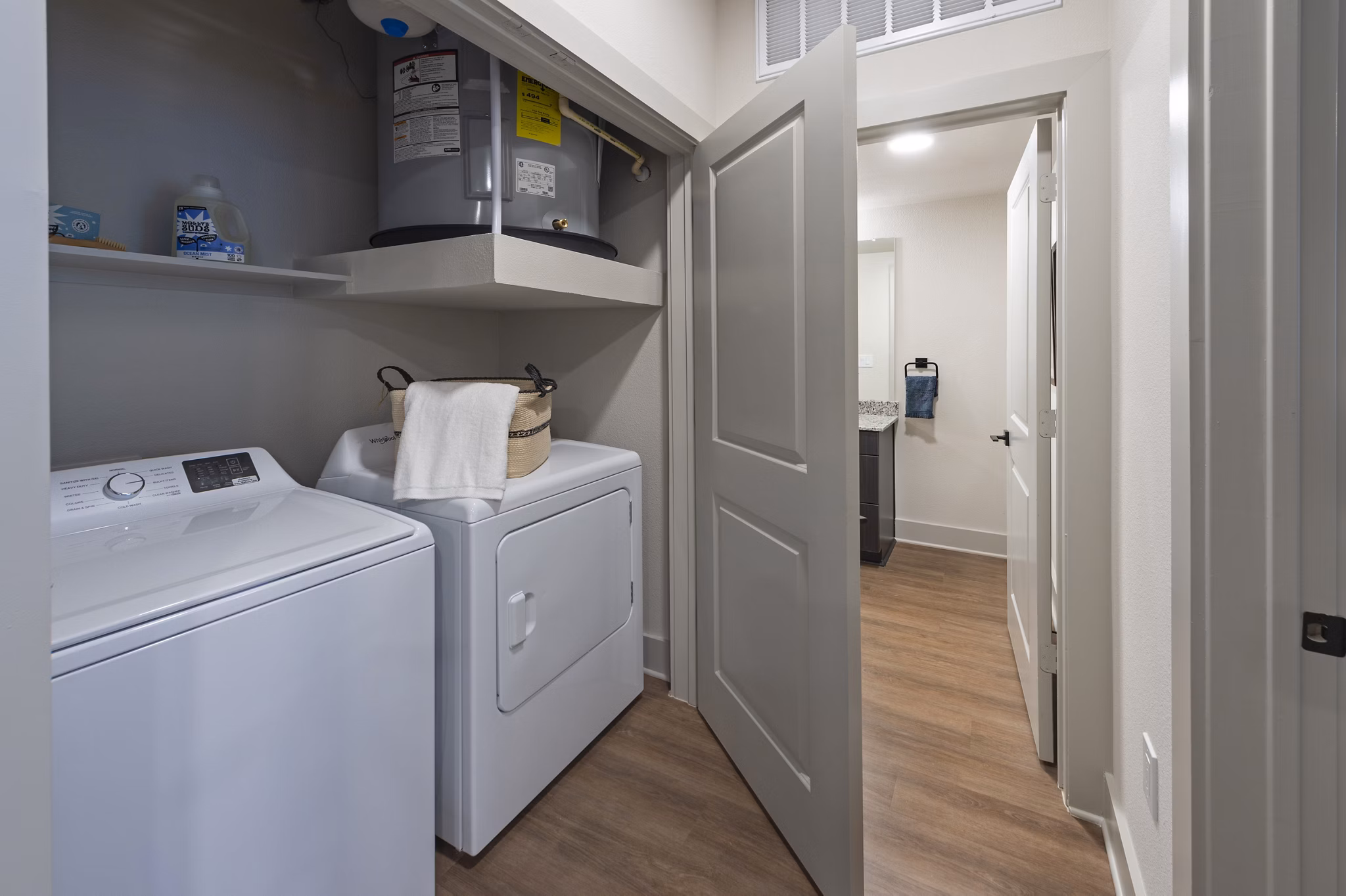 laundry room at Domain Huntsville Apartments