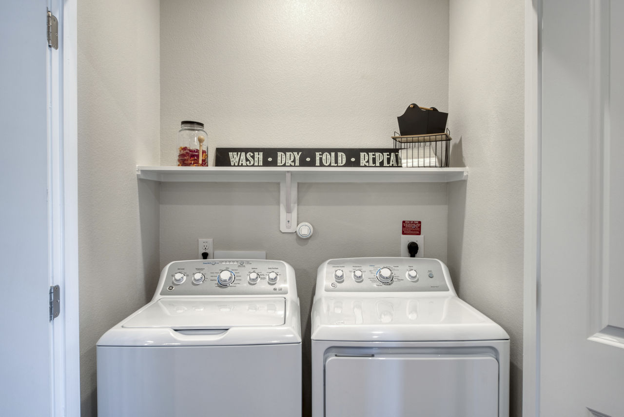 Laundry room at Lumen Residences