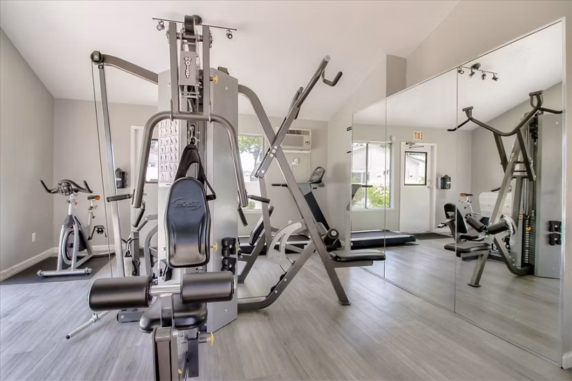 fitness center at Village Green Apartments