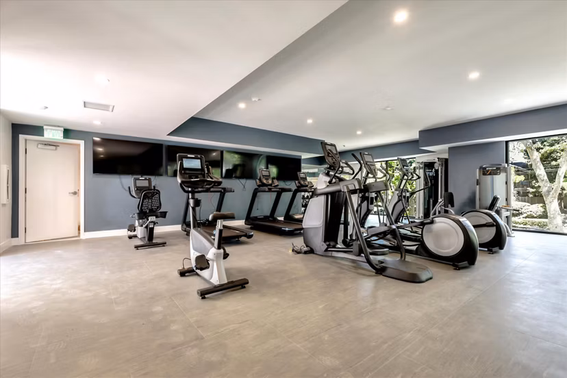 fitness center at 100 Boyd Apartments