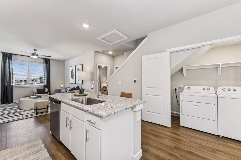 kitchen and laundry room at Cottages at Lindsey Place Apartments