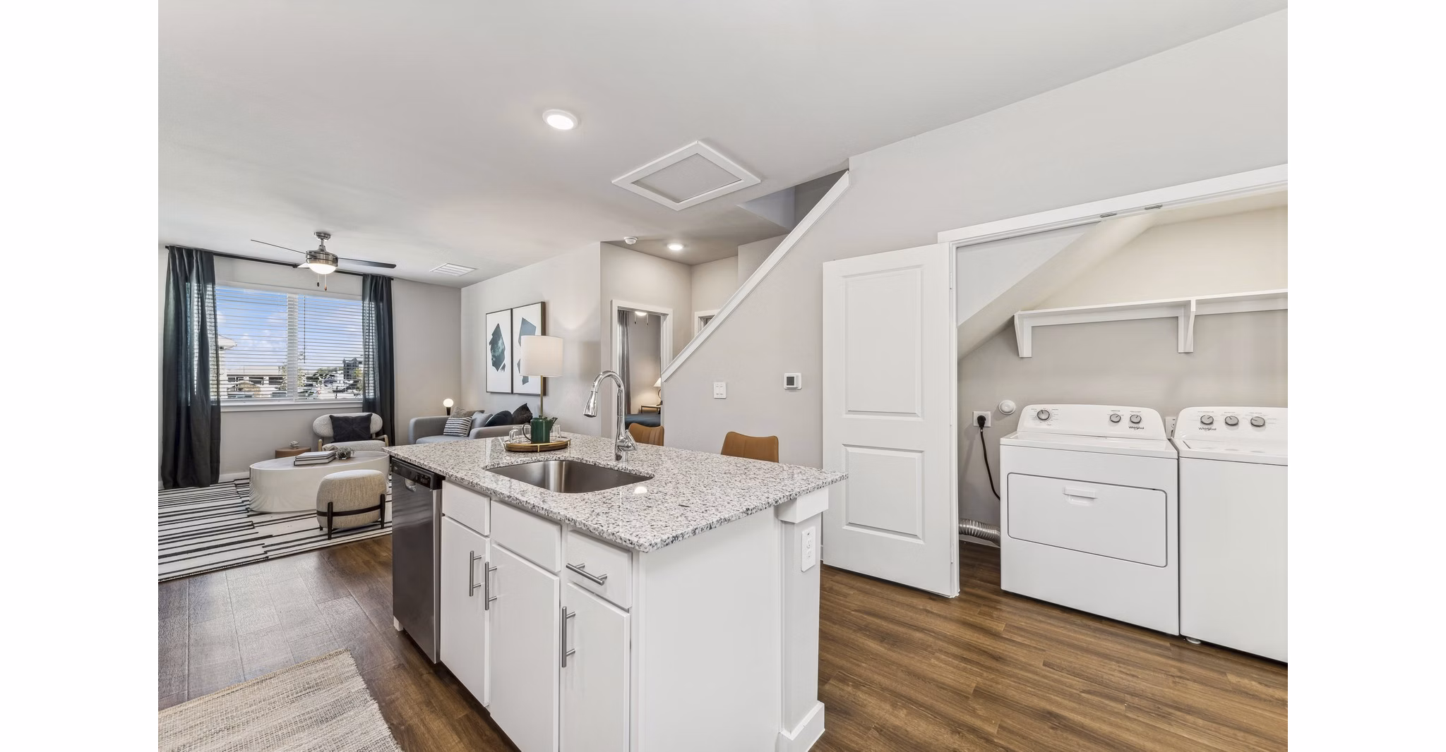 kitchen and laundry room at Cottages at Lindsey Place Apartments
