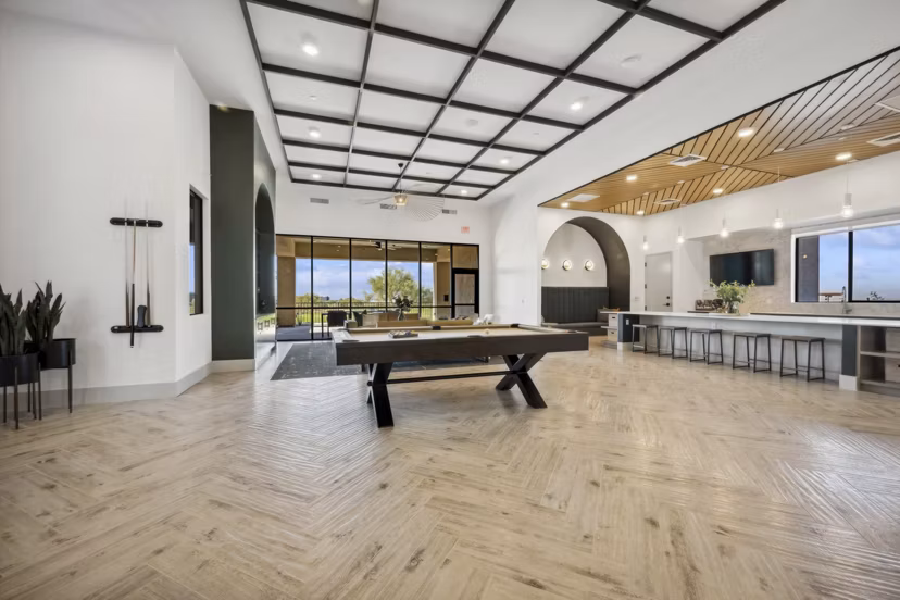 clubhouse game room area at Ascend at Longbow Highpoint Apartments