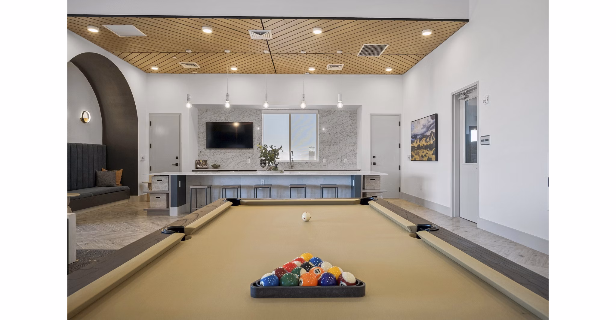 clubhouse game room area at Ascend at Longbow Highpoint Apartments