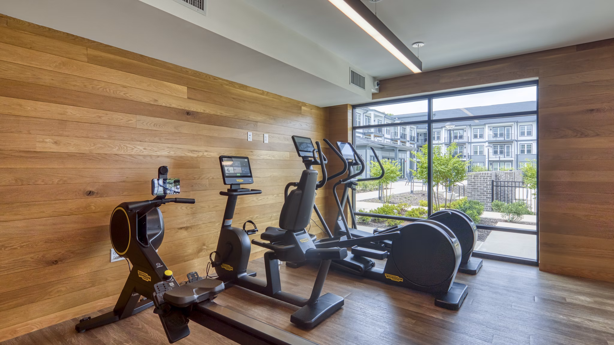 fitness center at Ainsworth Apartments