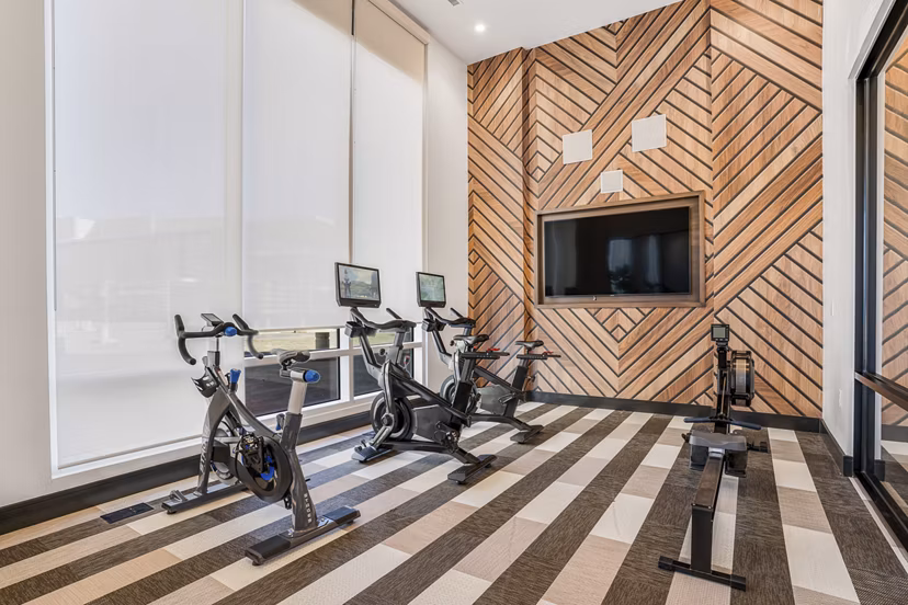 fitness center at Ovation at Galatyn Park Apartments