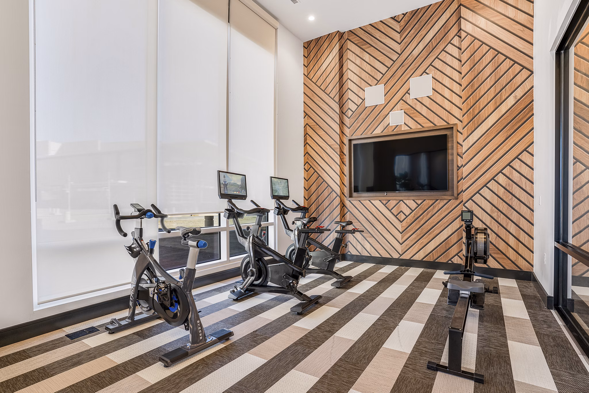 fitness center at Ovation at Galatyn Park Apartments