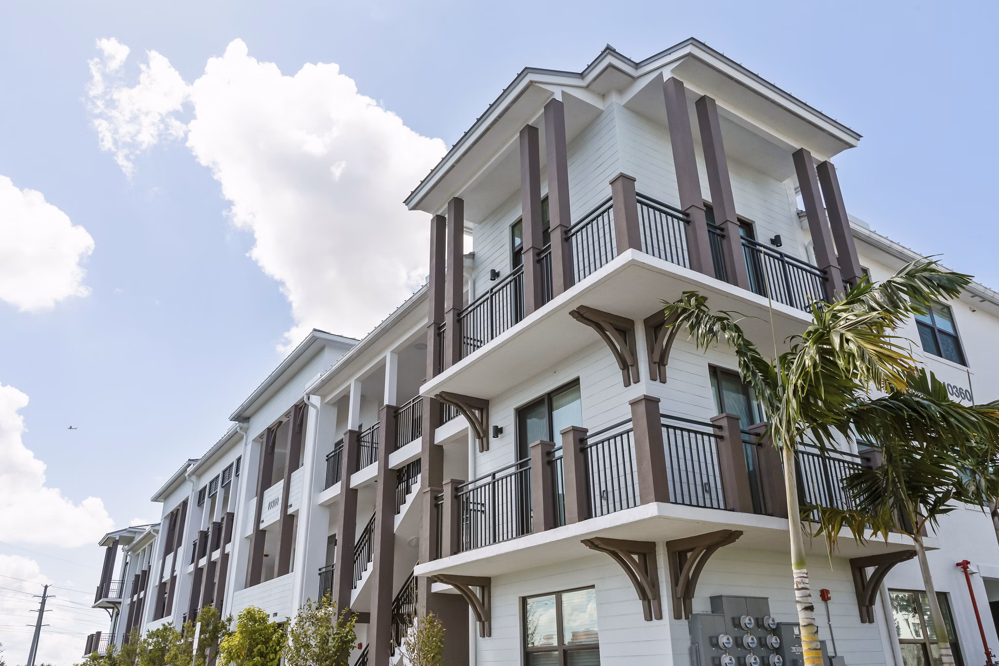 building at Pines Garden at City Center Apartments