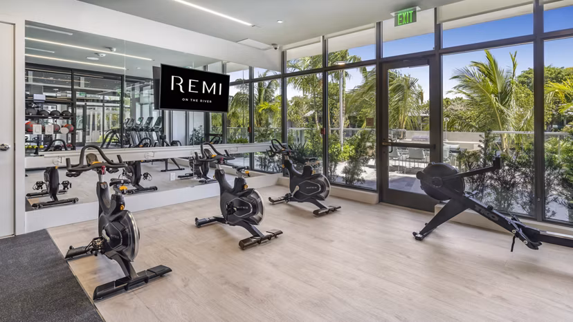 fitness center at Remi on the River Apartments 