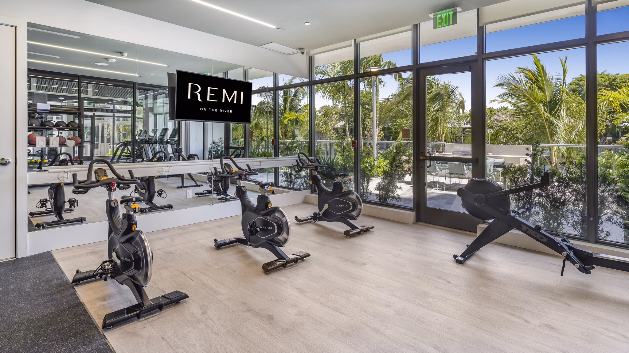 fitness center at Remi on the River Apartments 