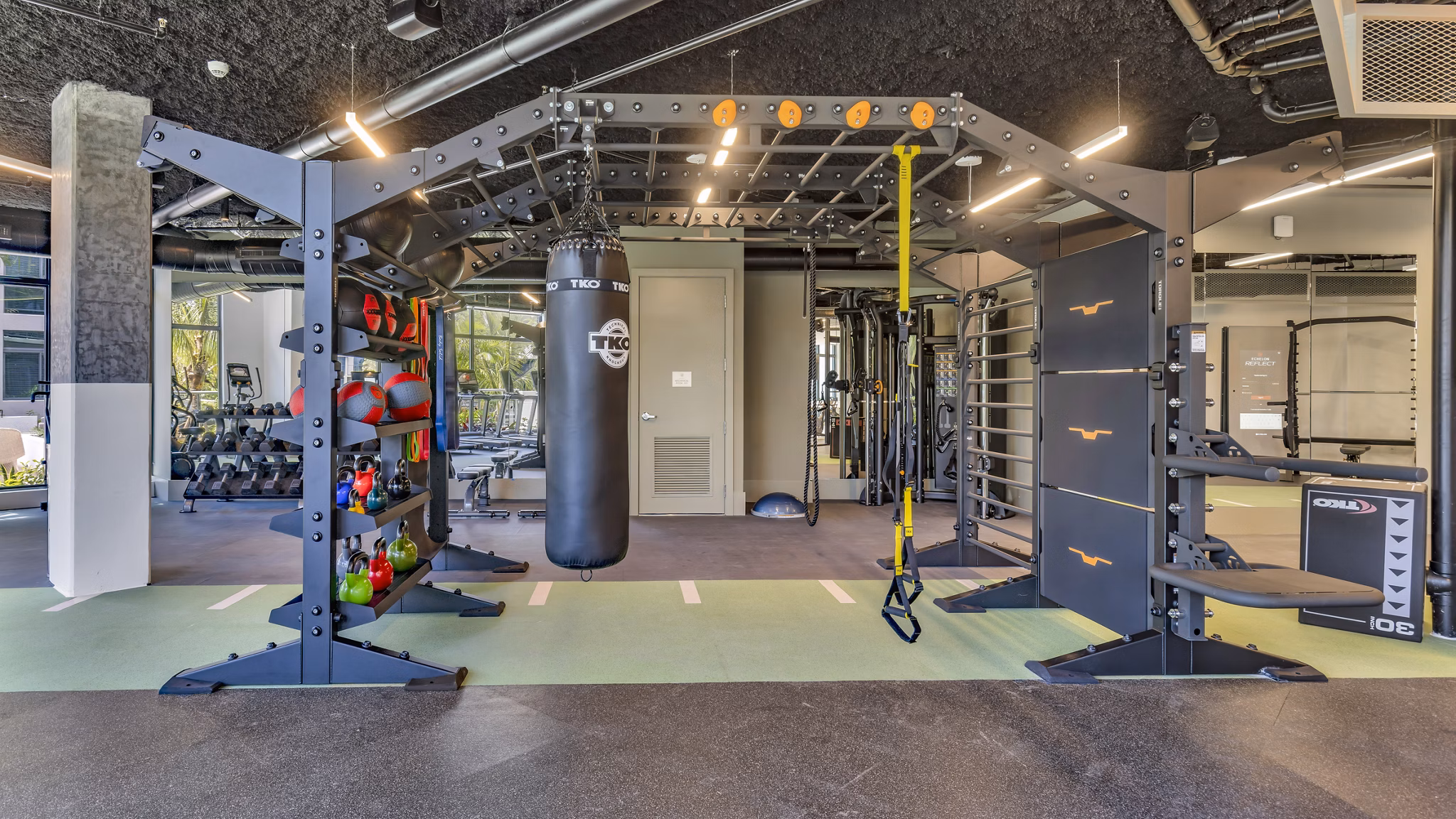 fitness center at Remi on the River Apartments 