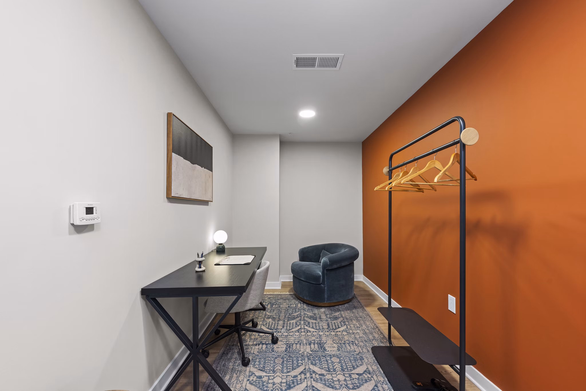 closet at Trella Uptown Apartments