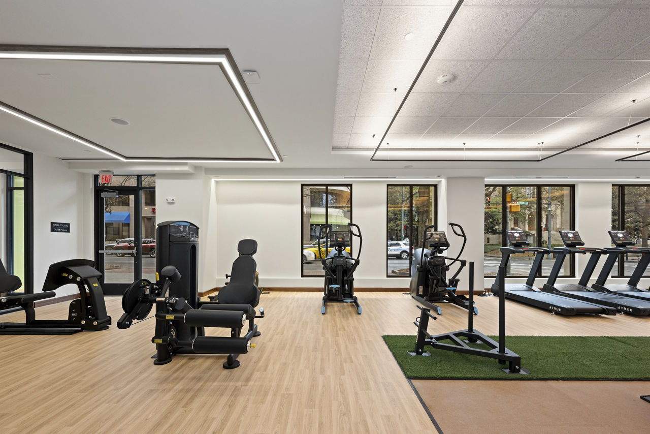 Gym at Trella Uptown Apartments (2 of 3)
