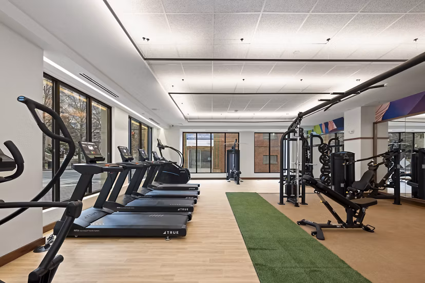 fitness center at Trella Uptown Apartments