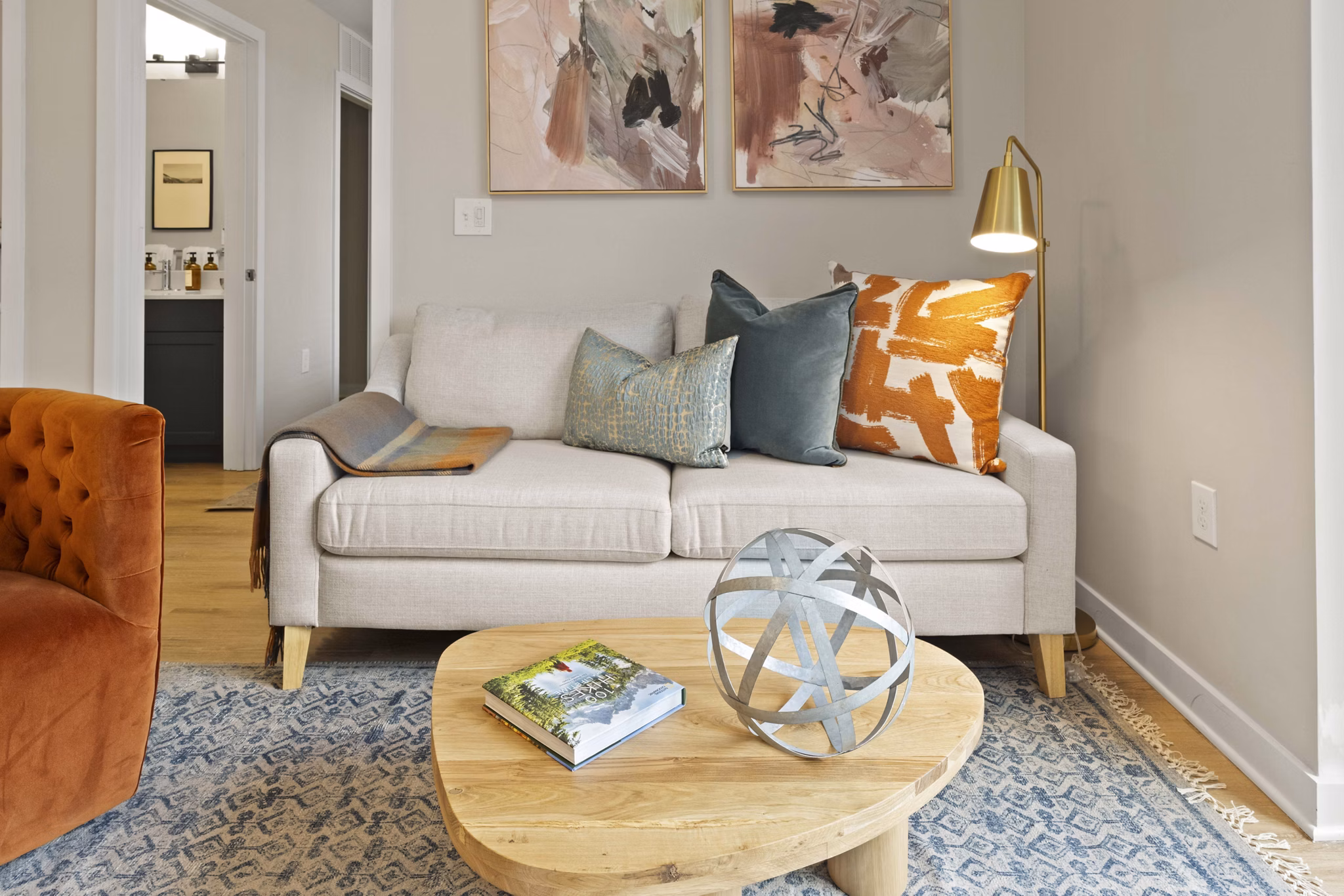 living room at Trella Uptown Apartments