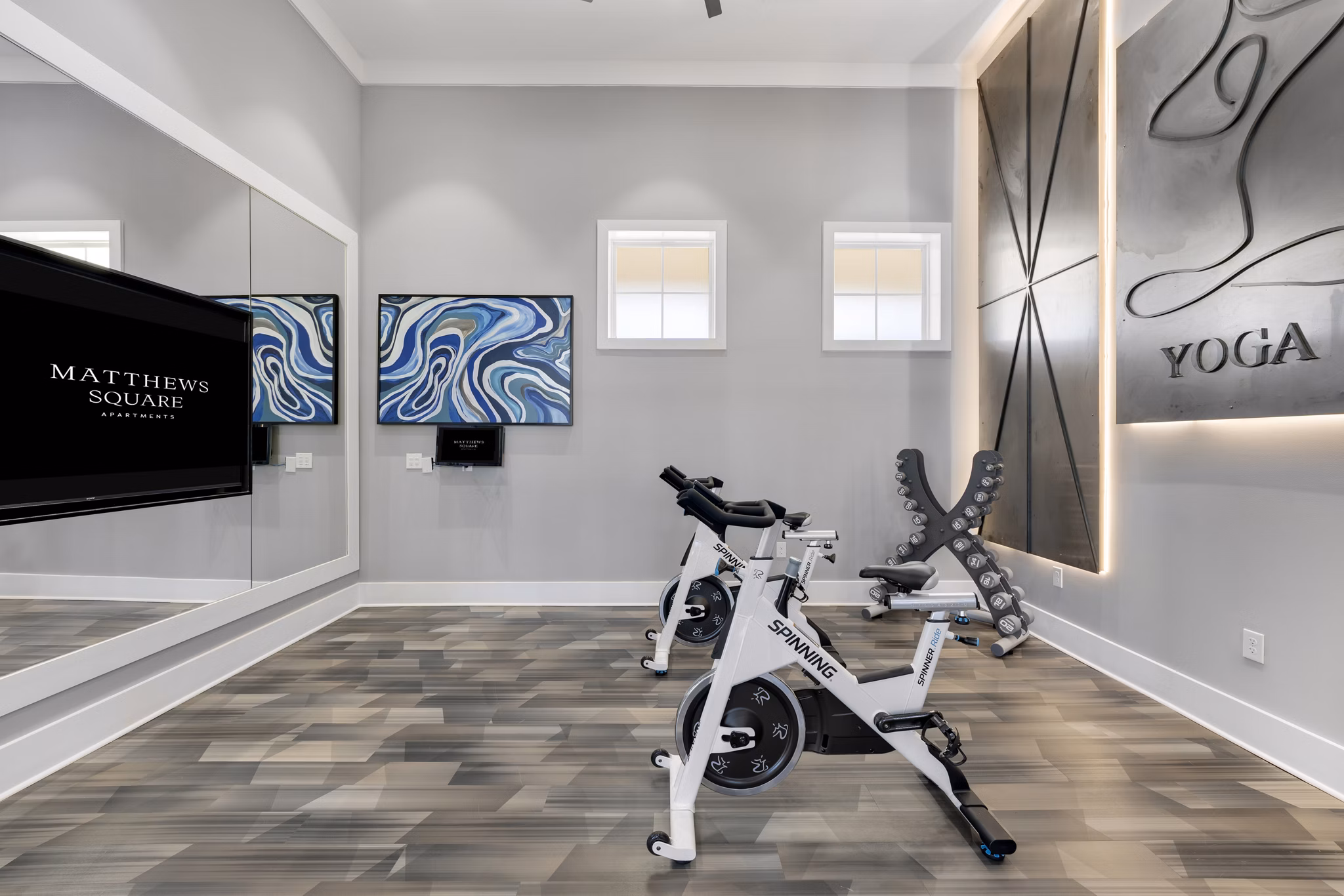 fitness center at Matthews Square Apartments